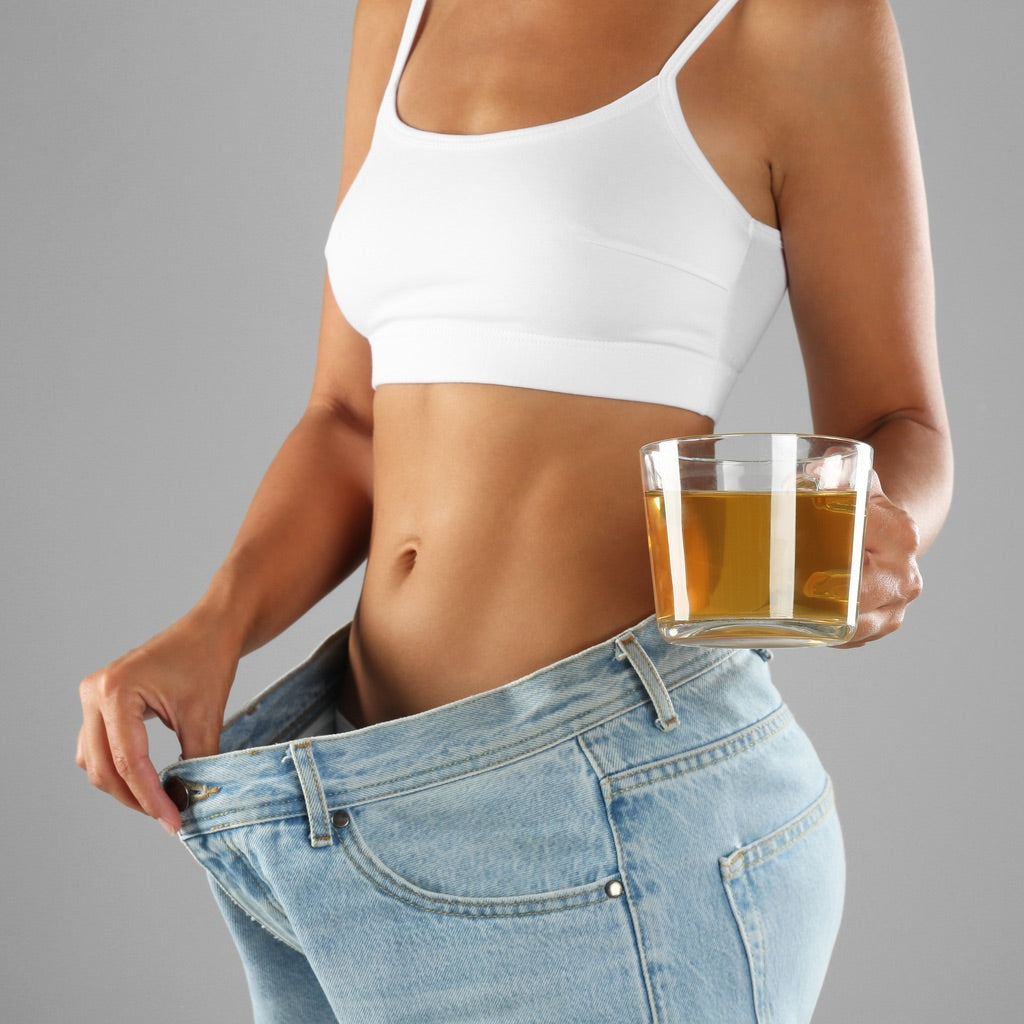Woman with Green Tea and showing weight loss
