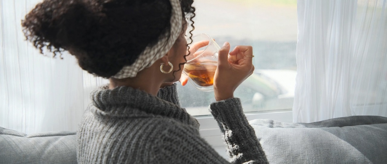 A girl drinking lemongrass tea