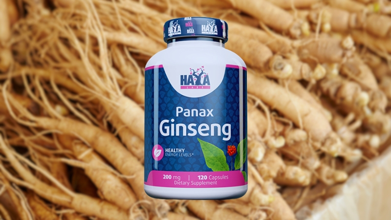 A Bottle of Panax Ginseng Capsules in Front of Ginseng Roots